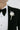 Groom's buttonhole of ivory white roses from award winning wedding florist The Flower Lounge in Manchester.