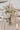 Small wedding table decor of three bud vases in soft blush, pink and cream tones from award winning wedding florist The Flower Lounge in Manchester.