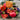 Colorful bouquet of flowers on a wooden surface