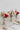 small wedding table decorations with three bud vases in vibrant colours full of bold bright colours from Manchester wedding florist The Flower Lounge.